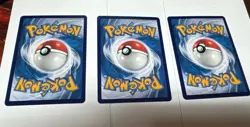 Three Random Pokemon cards (3 Holos Guaranteed) Nm - Image 1