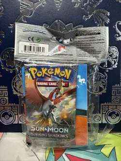 Pokemon Sun & Moon Burning Shadows Booster Pack + Mini Binder Collector's Album - Image 1