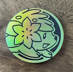 Pokemon TCG Light Green Shaymin Coin - Image 1