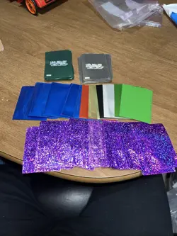 Lot Of Over 100 Card Sleeves Including 62 Yugioh Sleeves Silver And Green Rare - Image 1