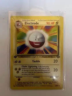 Electrode 18/64 - 1st Edition Jungle Error Misprint - Pokemon Card - Image 1