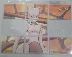 Topps Pokemon First Movie Puzzle set of 7 Blue Logo - Image 1
