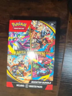 Pokemon TCG: Mega Evolution Booster Bundle 6 Booster Pack In Hand - Image 1