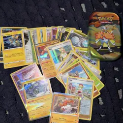 Pokemon Lot Of 40 Holos And Reverse Holos With Collectible Tin - Image 1