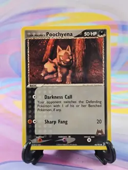 Pokemon TCG Team Magma vs. Team Aqua Card | Team Magma's Poochyena 66/95 Common - Image 1