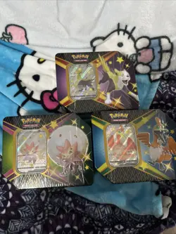 Pokemon TCG Shining Fates Tins - Eldegoss V, Cramorant V, Boltund V- 3 Tin Set - Image 1