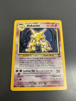 Pokemon TCG Alakazam Holo 1/130 Base Set 2 Holographic Near Mint - Image 1