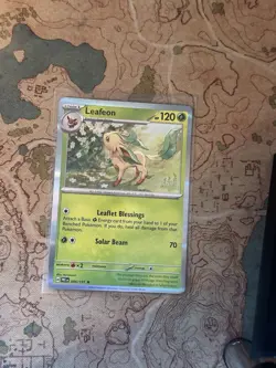 Leafeon #005/131 Holo Pokemon Card SV: Prismatic Evolutions - Image 1