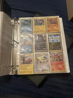 random pokemon cards in a binder - Image 1