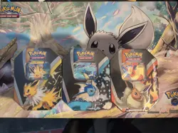 Pokemon TCG: Eevee Evolutions Tin (Set Of 3) Jolteon/Vaporeon/Flareon - Image 1