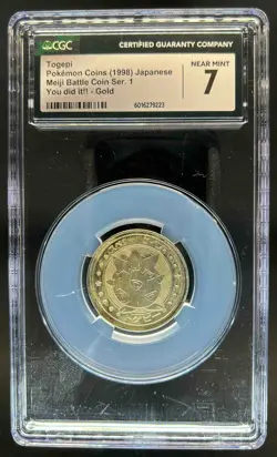1998 Pokemon Coins Japanese Togepi Meiji Battle Coin You Did It! Gold CGC 7 - Image 1
