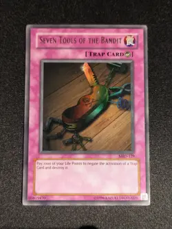 Yu-Gi-Oh! Seven Tools of the Bandit MRD-129 Unlimited Ultra Rare HP/Damaged - Image 1