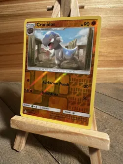 Pokemon SM - Ultra Prism Uncommon Cranidos #64/156 Reverse Holo NM - Image 1