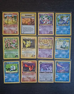 Pokemon 1st Edition NM Card Lot (12) Pikachu Charmander Ivysaur Wartortle Etc.. - Image 1