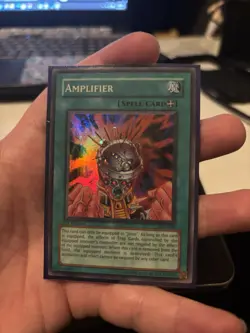 Amplifier ast-040 1st Edition (NM/NM+) Super Rare Yu-Gi-Oh! - Image 1