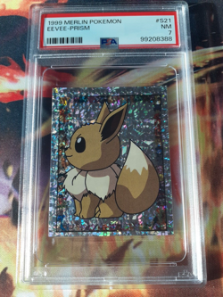 Pokemon 1999 Eevee S21 Prism Holo Merlin Sticker PSA 7 NM - Image 1