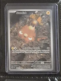 Pokemon Stunfisk 2024 Illustration Surging Sparks 202/191 Near Mint Condition - Image 1