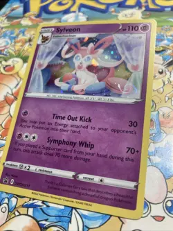 Pokemon TCG Trading Card 2022 Black Star Promo Sylveon SWSH211 Cosmos Holo SWIRL - Image 2