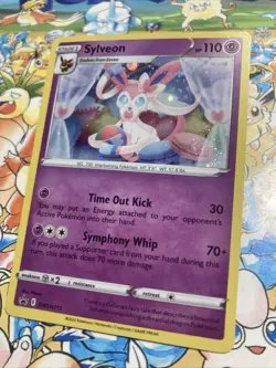 Pokemon TCG Trading Card 2022 Black Star Promo Sylveon SWSH211 Cosmos Holo SWIRL - Image 3