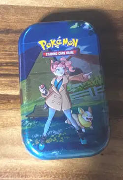 Pokemon Crown Zenith Mini Tin Sonia Sealed 2 Packs 1 Sticker Sheet 1 Art Card - Image 1