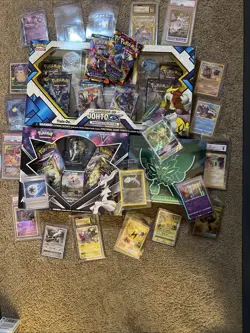 Used Pokemon Lot XC As Seen Some Dents And Tears On Boxes Or Cards - Image 1
