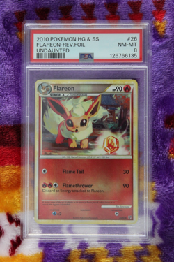 Pokemon TCG Flareon 26/90 Undaunted Reverse Holo PSA Grade 8 - Image 1