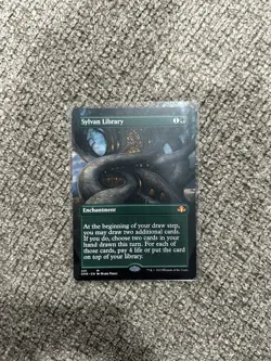 Sylvan Library (Borderless) Dominaria Remastered Regular - Image 1