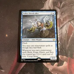 MtG Valley Floodcaller - NM - Bloomburrow - Image 1