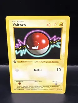 Pokemon TCG Voltorb Card 67/102 1st Edition Base Set Shadowless - Image 1