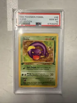 1999 POKEMON FOSSIL 1ST ED #46 EKANS PSA 10 - Image 1