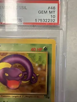 1999 POKEMON FOSSIL 1ST ED #46 EKANS PSA 10 - Image 3