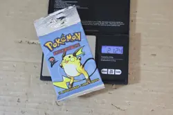 POKEMON BASE SET 2 BOOSTER PACK RAICHU FACTORY SEALED LONG CRIMP WOTC 2000 og - Image 1