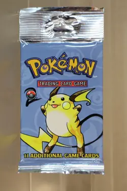POKEMON BASE SET 2 BOOSTER PACK RAICHU FACTORY SEALED LONG CRIMP WOTC 2000 og - Image 2