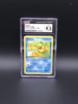 CGC 9.5 MINT + Psyduck 1999 Fossil - 1st Edition 53/62 Pokemon Card - Image 1