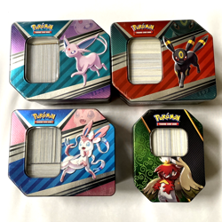Four Pokemon Trading Card Tins Containing Cards - Image 1