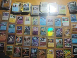 Assorted Pokemon card lot for sale - Image 1