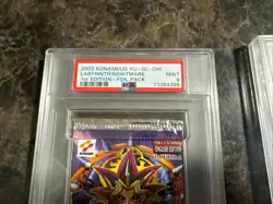 2003 Yu-Gi-Oh! Labyrinth of Nightmare 1st Edition LON Booster Pack PSA 9 Mint - Image 2
