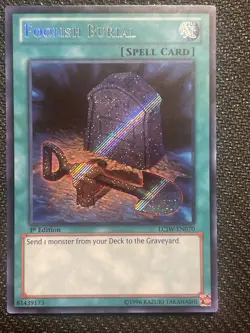 Yu-Gi-Oh LCJW-EN070 Foolish Burial Secret Rare 1st Edition LP - Image 1