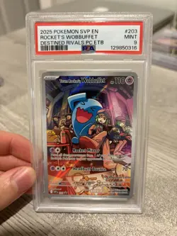 2025 POKEMON DESTINED RIVALS POKEMON CENTER #203 TEAM ROCKET'S WOBBUFFET PSA 9 - Image 1