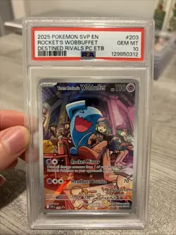 2025 POKEMON BLACK STAR PROMO POKEMON CENTER ETB TEAM ROCKET'S WOBBUFFET PSA 10 - Image 1