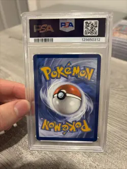 2025 POKEMON BLACK STAR PROMO POKEMON CENTER ETB TEAM ROCKET'S WOBBUFFET PSA 10 - Image 2