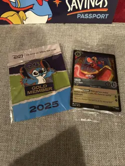 Disney Lorcana D23 2025 Gold Member Exclusive Iago Foil Promo Card &Stitch Pin - Image 1
