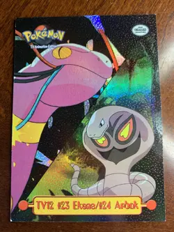 1999 Topps Pokemon TV #TV12 Ekans/Arbok Rainbow Foil Sandpaper finish B - Image 1