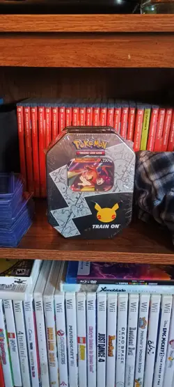 Pokemon TCG Lance’s Charizard V Celebration Tin. 25th Anniversary Factory Sealed - Image 1