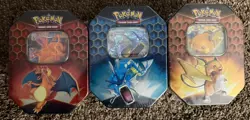 Pokemon Hidden Fates Tins Charizard Gyarados Raichu GX Boxes - Set of 3 - Image 1