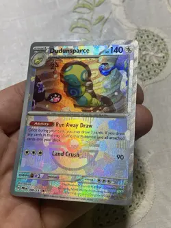Scarlet And Violet Prismatic Evolutions Dudunsparce Pokeball Card. - Image 3