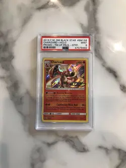 Pokemon 2019 PSA 9 STAFF Charizard Holo #SM158 - Team Up Prerelease - Image 1