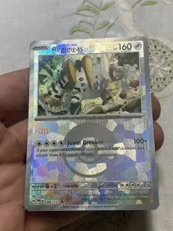 Scarlet And Violet Prismatic Evolutions Regigigas Pokeball Card. - Image 3