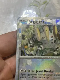 Scarlet And Violet Prismatic Evolutions Regigigas Pokeball Card. - Image 4