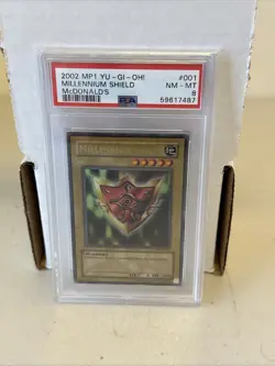 2002 YU-GI-OH! TCG McDonald’s MP1-001 MILLENNIUM SHIELD Trading Card PSA 8 NM-MT - Image 1